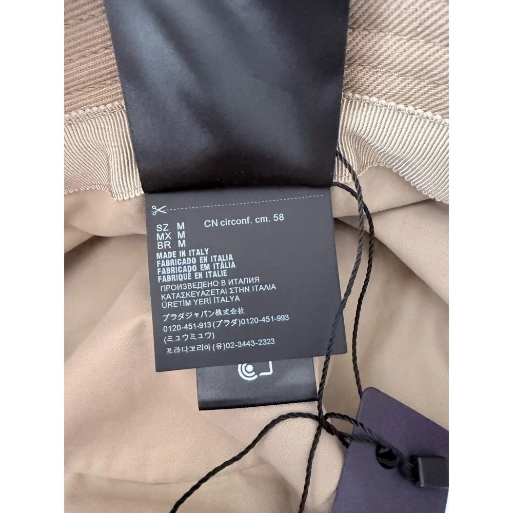 Prada 1HC137 100% cotton bucket hat with embroidered white stitch logo